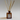 Flourish Emporium Reed Diffuser bottle in amber